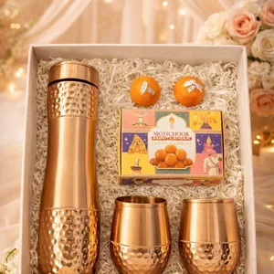 Elegant Copper Bottle & Ladoo Candle Set